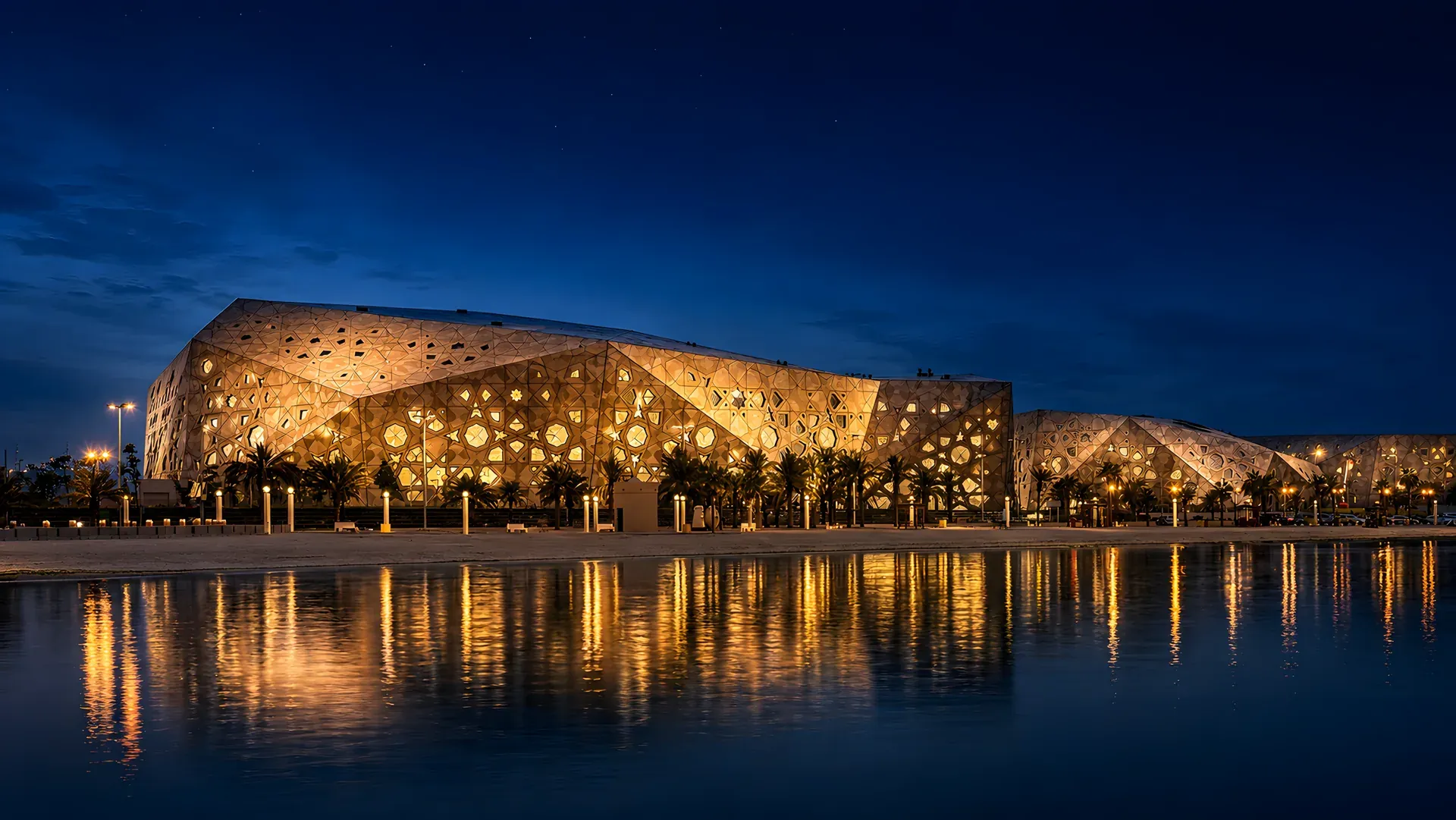 A contemporary cultural landmark in Kuwait at night